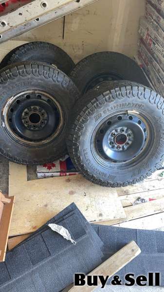 4 rims and tires in great condition for a truck 