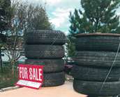 four tires and rims, with 4 stud ...