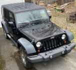 2011 Jeep Wrangler Unlimited Sport - one owner.