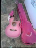 Gypsy Rose guitar ,soft case , and strap.
Both is ...