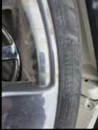 22" All Season Tires on Aluminum Rims - Photo 3 of 4