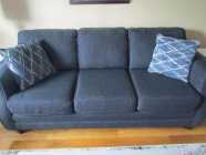 3 seater couch, dark blue/navy with 2 throw cushions. ...