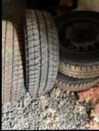 4 Blizzak tires on rims for Toyota Corolla 