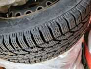 4 Firestone studded tires with rims - Photo 1 of 2