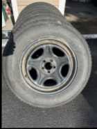 4 Firestone Winterforce tires on rims - Photo 2 of 3