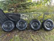 4 winter studded tires and rims 