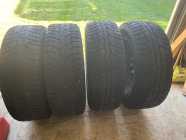 4 winter studded tires on steel rims 