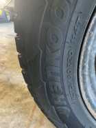 4 winter studded tires on steel rims  - Photo 1 of 5