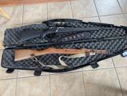 Includes composite and original wood stock. Scope, ...