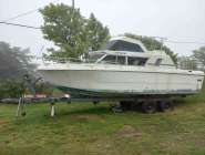 with trailer, no motor, in need of repairs, call for ...
