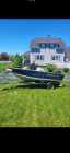 Aluminum boat, motor, and trailer