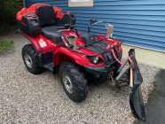 ATV with blade for snow removal