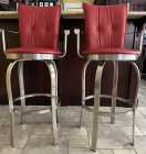 Two bar height red leather stools. Solid metal frame. ...