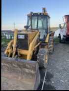 John Deere 310D back hoe - Photo 1 of 6