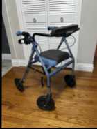 Walker with wheels, handles & seat