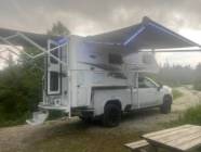 2025 GMC SIERRA 3500 AT4 PREMIUM W NORTHERN LITE CAMPER - Photo 1 of 7