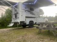 2025 GMC SIERRA 3500 AT4 PREMIUM W NORTHERN LITE CAMPER - Photo 2 of 7