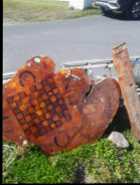 AT BONAVISTA: Chainsaw carved table one of a kind