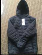 Brand new Men's North Western puffer jacket