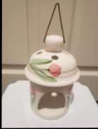 Ceramic lantern with metal handle $4.55