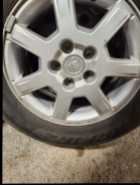 CHEV 5 hole rims and tires - Photo 1 of 3