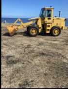 Loader comes with power angle blade. Works Great. Seller ...