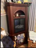 Corner wooden cabinet fireplace with bookshelves