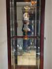 Display cabinet with sliding door and key locl