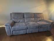 Dual reclining sofa