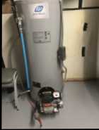 Efficiency oil fired furnace and hot water tank. - Photo 2 of 10