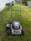 Electric lawn mower. Works well.