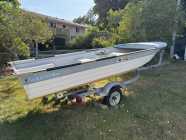 Fiberglass Boat, Motor, and Trailer - Photo 1 of 5