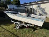 Fiberglass Boat, Motor, and Trailer - Photo 2 of 5