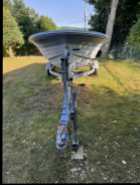 Fiberglass Boat, Motor, and Trailer - Photo 3 of 5