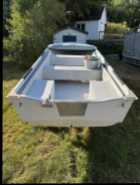 Fiberglass Boat, Motor, and Trailer - Photo 4 of 5