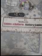 FIRM::: vtg Kenlite sign for "Cables a Batterie" a