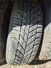 Four Goodyear 195/65R15 Studded Tires on the rims,