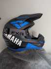 FXR Yamaha helment with goggles.