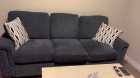 Grey sofa with pillows 