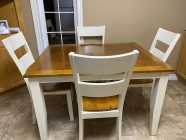 Solid wood table with four chairs  - Photo 1 of 2