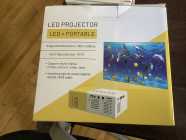 Led + portable projector.   