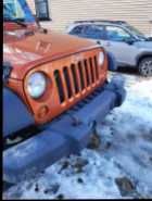 low milage- 2010 Jeep Wrangle Sport - Photo 2 of 4