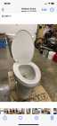 New toilet. Used one day.  - Photo 1 of 2