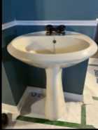 Pedestal sink with faucet - Photo 1 of 3