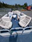 Pontoon Boat + motor + trailer (2004) - Photo 1 of 4