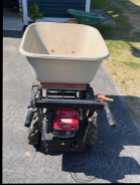 POWER BARROW MOTORIZED WHEELBARROW AND DUMP TRUCK - Photo 1 of 4