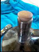 PRIMITIVE BROWN & WHITE STONEWARE LONG NECK WHISKY - Photo 1 of 3