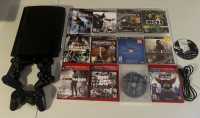 PS3 console with controllers and games