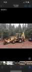 Rubber tire backhoe - Photo 1 of 2