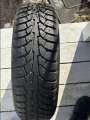 SELLING A WINTER STUDDED TIRE - Photo 1 of 2